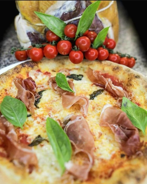 Specialty Pizza with Ham and Cherries